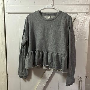 Grey peplum sweatshirt